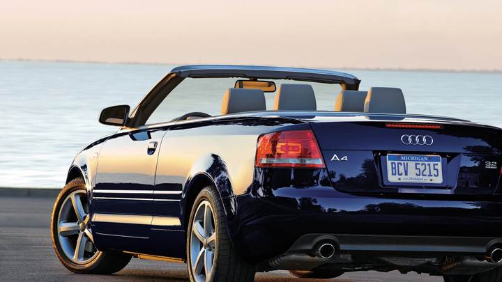 Back Pose Of Audi A4 Cabriolet In Black Near Sea Side